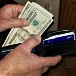MONEY! Finance and Wealth! Spending Cash! Man's Hands Removing Cash from Wallet!